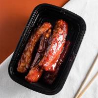 Bbq Rib (4) · Ribs with barbecue sauce.