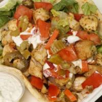 Chicken Gyro Sandwich · Pita bread - Grilled chicken, grilled onions, cucumber sauce, tomatoes, and lettuce (spicy b...