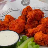 Boneless Wings · Hand-breaded, with celery and bleu cheese or ranch; tossed in choice of sauce