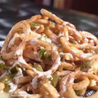 Fire Fry · Cayenne-seasoned fries, queso, green chilies, fried onions, chipotle ranch