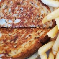 Patty Melt · A one third-pound burger smothered with grilled onions and melted cheese on grilled rye brea...