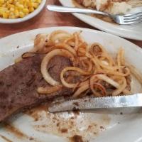 Liver & Onions · Expertly prepared and served with golden brown, grilled onions.

Consuming raw or undercooke...