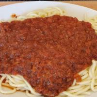 Spaghetti · Perfectly cooked spaghetti topped with delicious, homemade sauce and soup or salad.