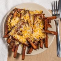 Cheesy Fries · Fries with finely shredded cheddar and monterrey jack melted on top.