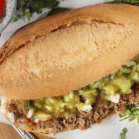 Taco Torta · Toasted Mexican sandwich topped with your favorite meat, cilantro, onions and salsa. Choose ...