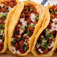 Chorizo Tacos · 3 Tacos filled with spicy Mexican sausage, topped with cilantro, onions and your favorite ho...