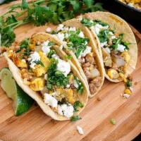 Pollo  Asado Tacos · 3 Tacos filled with grilled chicken, topped with cilantro, onions and your favorite home mad...