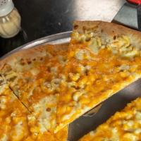 Mac & Cheese · Macaroni pasta, white cream sauce, cheddar & mozzarella cheese.