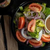 House Salad · Romaine lettuce, onions, tomatoes & balsamic vinaigrette dressing.