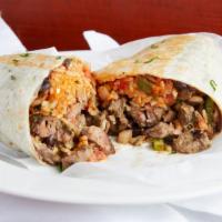Burrito Special · Beans, lettuce, tomato cheese, sour cream and your choice of meat wrapped in a big flour tor...