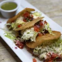 Gorditas · Three homemade gorditas with your choice of meat, topped with lettuce, pico de gallo and che...