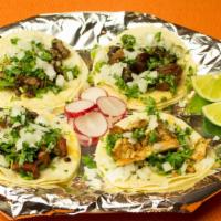 Street Taco · Your choice of asada, pastor, pollo, carnitas, or chorizo topped with onions and cilantro.