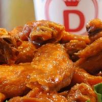 Party Wings 40 Pcs · You can select up to 4 different flavors.  Comes with your choice of Blue Cheese or House Ma...