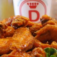 Whole Wings 20 Pcs · You can select up to 2 different flavors.  Comes with your choice of Blue Cheese or House Ma...