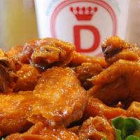 Whole Wings 50 Pcs · You can select up to 4 different flavors.  Comes with your choice of Blue Cheese or House Ma...