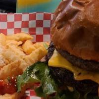Farm Yard Burger · Our checkered cow burger with fried egg, bacon and cheese.  Your choice of beef, turkey, or ...