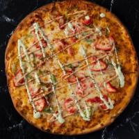 Chicken Tikka Pizza · A pizza loaded with tikka masala, mozzarella, chicken, onions, green peppers, Moti sauce, ci...