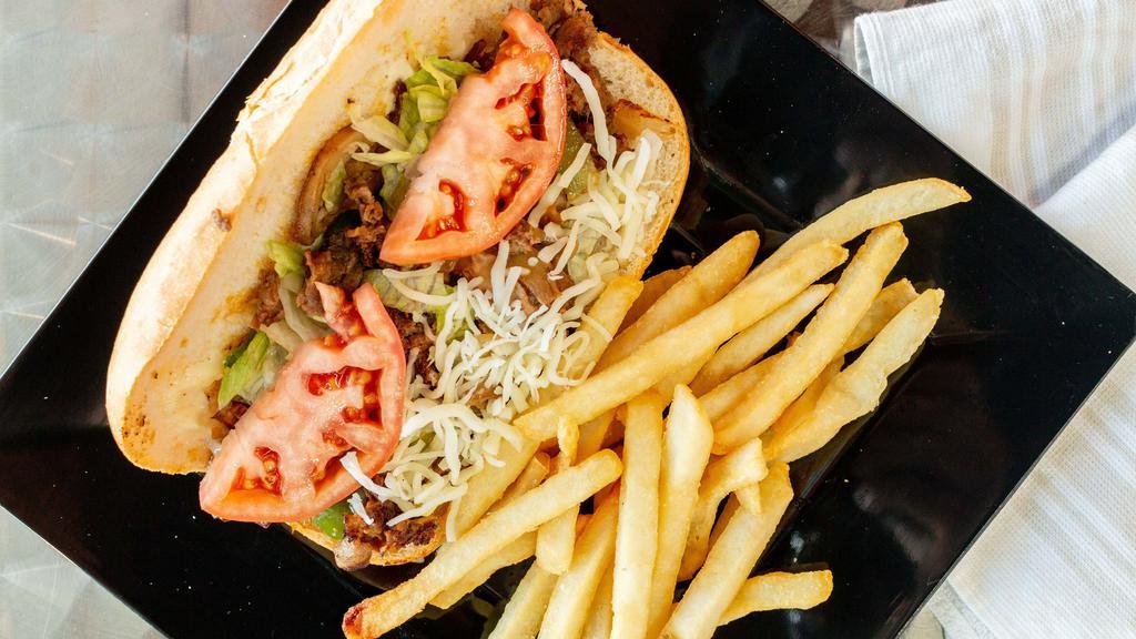 Philly Cheesesteak · Phillies come with cheese, lettuce. tomatoes, mayo, grilled onions, green peppers, mushrooms.
