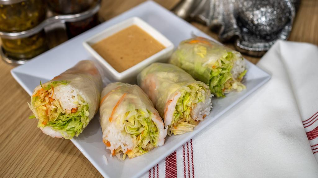 Fresh Summer Spring Rolls  · Two rolls stuffed with shrimp, chicken, vegetables and noodles served with peanut curry sauce.