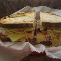 Boar'S Head Cajun Turkey With Imported Swiss · Vermont cheddar cheese, lettuce, tomato and mayonnaise or Boar's Head dressing.