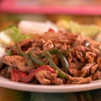 Fajita Salad · Your choice of tender strips of chicken breast or sirloin steak served over a bed of fresh l...