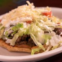 Sopes · Thicker and crisper than tortillas, 3 open faced, piled high with your choice of chicken or ...