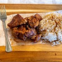 Chicken Adobo · Filipino staple dish made with garlic, vinegar, soy sauce and Filipino seasonings served wit...
