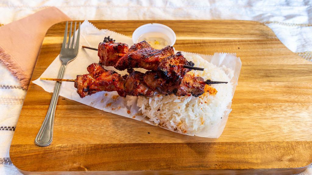 Bbq Pork Sticks · Marinated pork in our original marinade and seasonings, skewered and grilled.