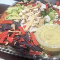 Chopped Salad · Fresh Chopped Iceberg Lettuce, Roasted Chicken Breast, Avocado, Tomatoes, Blue  Cheese,  App...