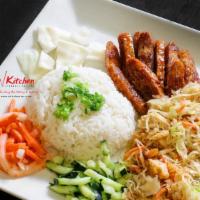 Vegan Rice Combo · Vegan. Rice plate with shredded tofu, carrot, and cabbage, served with onion, pickled carrot...