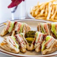 Club Sandwich · Triple decker, turkey, bacon, crisp lettuce, tomatoes and mayonnaise.