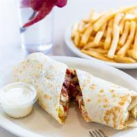 Chicken & Bacon Wrap · Sliced grilled chicken breast, bacon, blended cheese, lettuce and tomato wrapped in a grille...