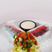Mexican Burrito · 12” tortilla filled with your choice of meat grilled veggies cheese and house special sauce....