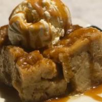 Cinnamon Roll Bread Pudding · Currants, pecan praline, bourbon sauce, vanilla gelato