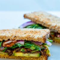 Vegan Sandwich · Paprika mushrooms, guac, red onions, spinach, cilantro, jalapenos, cucumbers on sourdough - ...