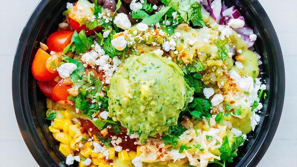 Southwest Bowl · Brown rice, cilantro lime chicken, corn, cherry tomatoes, black beans, red onions, cilantro, jalapeño relish, salsa, feta cheese and guac - topped with avocado hot sauce