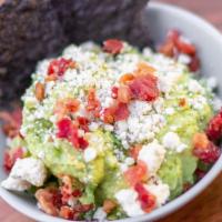 Bacon & Blue Cheese Guac W/ Chips · Classic guac topped with bacon bits & blue cheese