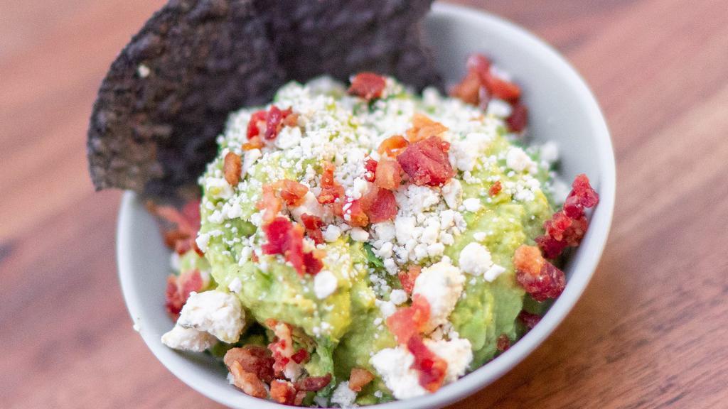 Bacon & Blue Cheese Guac W/ Chips · Classic guac topped with bacon bits & blue cheese