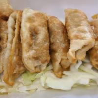 Potstickers (8Pieces) · Fried dumplings with pork filling