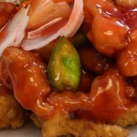 Sweet & Sour Chicken · Breaded white meat chicken with carrots  white onion green pepper and pineapple in sweet and...