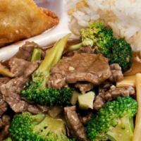 Beef With Broccoli · Tender beef fry with broccoli and bamboo strips in garlic brown sauce