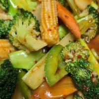 Hunan Vegetables  · Mixed veggies like broccoli, mushrooms, snow peas, carrots, chestnut, corn in garlic brown s...