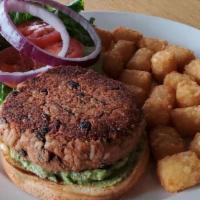 Veggie Black Bean Burger · Our house made black bean & rice patty topped w/ house made guacamole, lettuce, & onion.