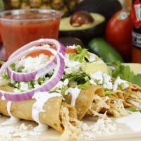 Tacos Dorados · Chicken, lettuce, cheese, tomato, cream, onion, and avocado.