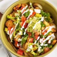 Fajita Bowl · lettuce, tomato, rice, beans, peppers, onions, sour cream, guacamole
& choice of: shrimp dia...