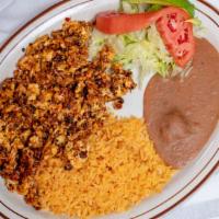 Huevos Con Chorizo · Three eggs mixed with Mexican sausage. Served with beans, rice and salad.
