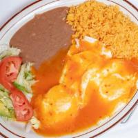 Huevos Rancheros · Three eggs with ranchero sauce. Served with beans, rice and salad.