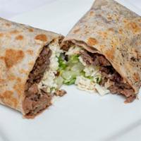 Burrito Asada · Steak. Served with beans, lettuce, tomato and cheese.