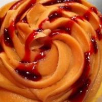 Pb&J · Vanilla cupcake topped with a layer of raspberry jam a swirl of peanut butter buttercream an...