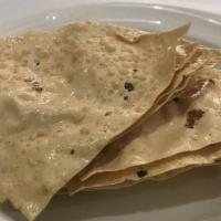 Papad (Choose Roasted Or Fried) · Three pcs. Lentil wafers served with mint and tamarind chutney.